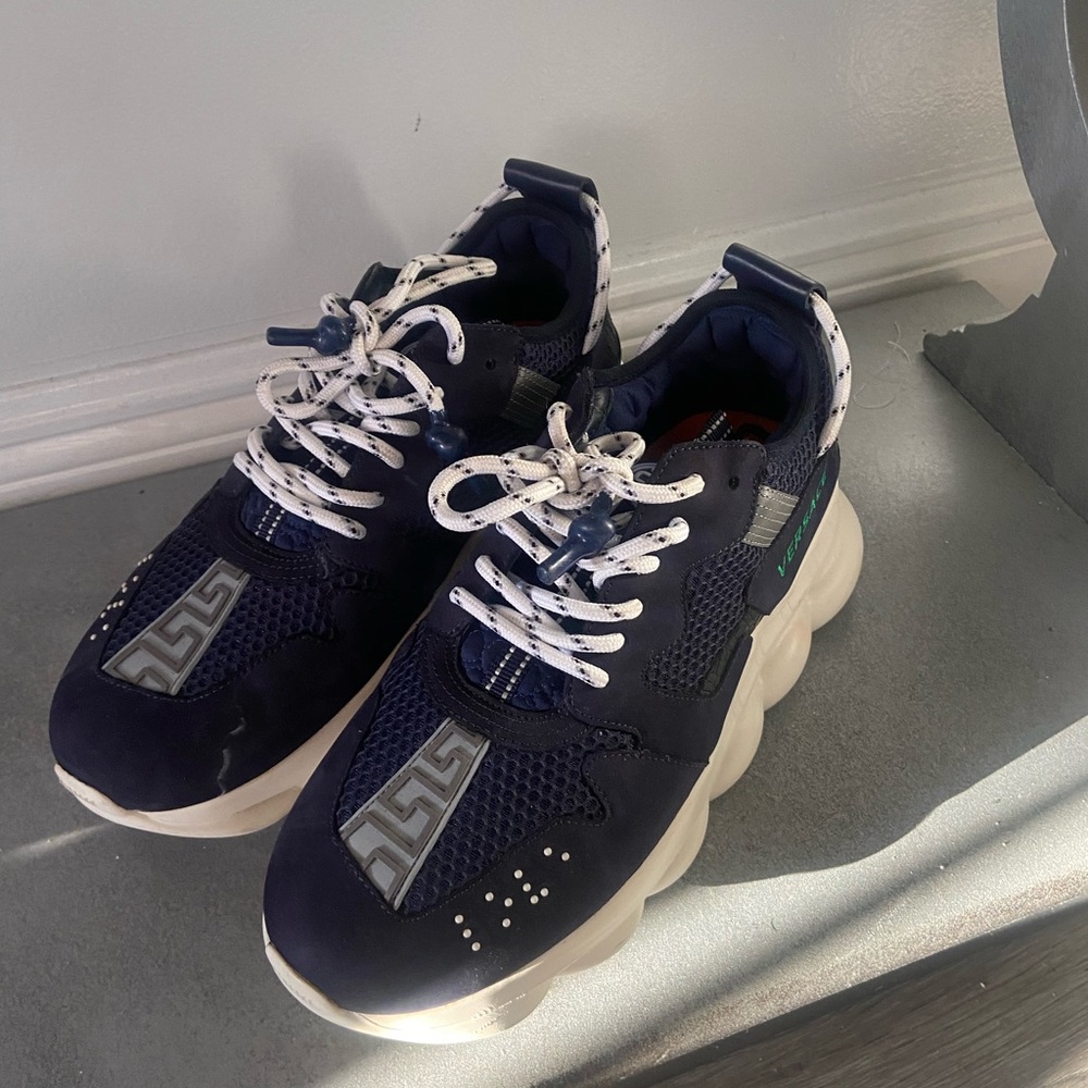 Versace chain reaction selling for $750, good condition, size 10.5